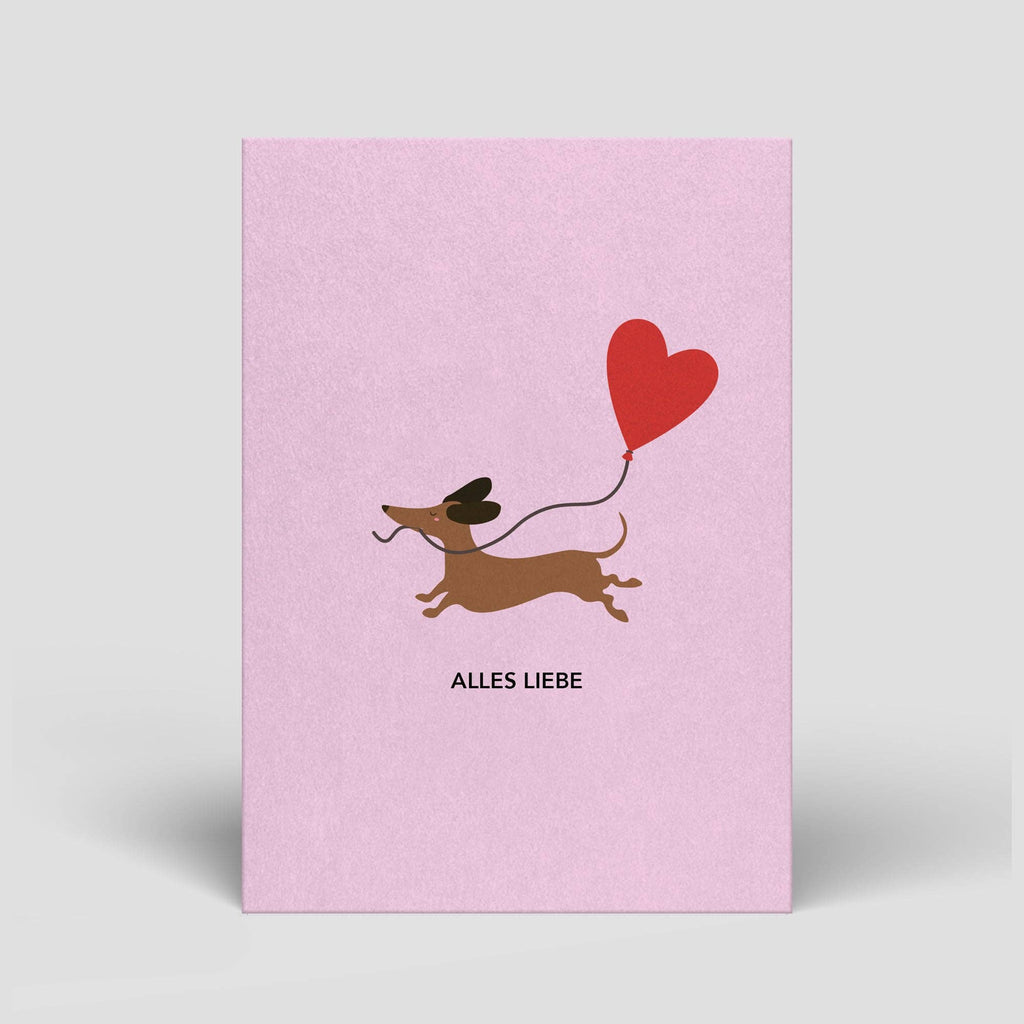Postkarte „Alles Liebe“ – Dackel mit Herzluftballon
