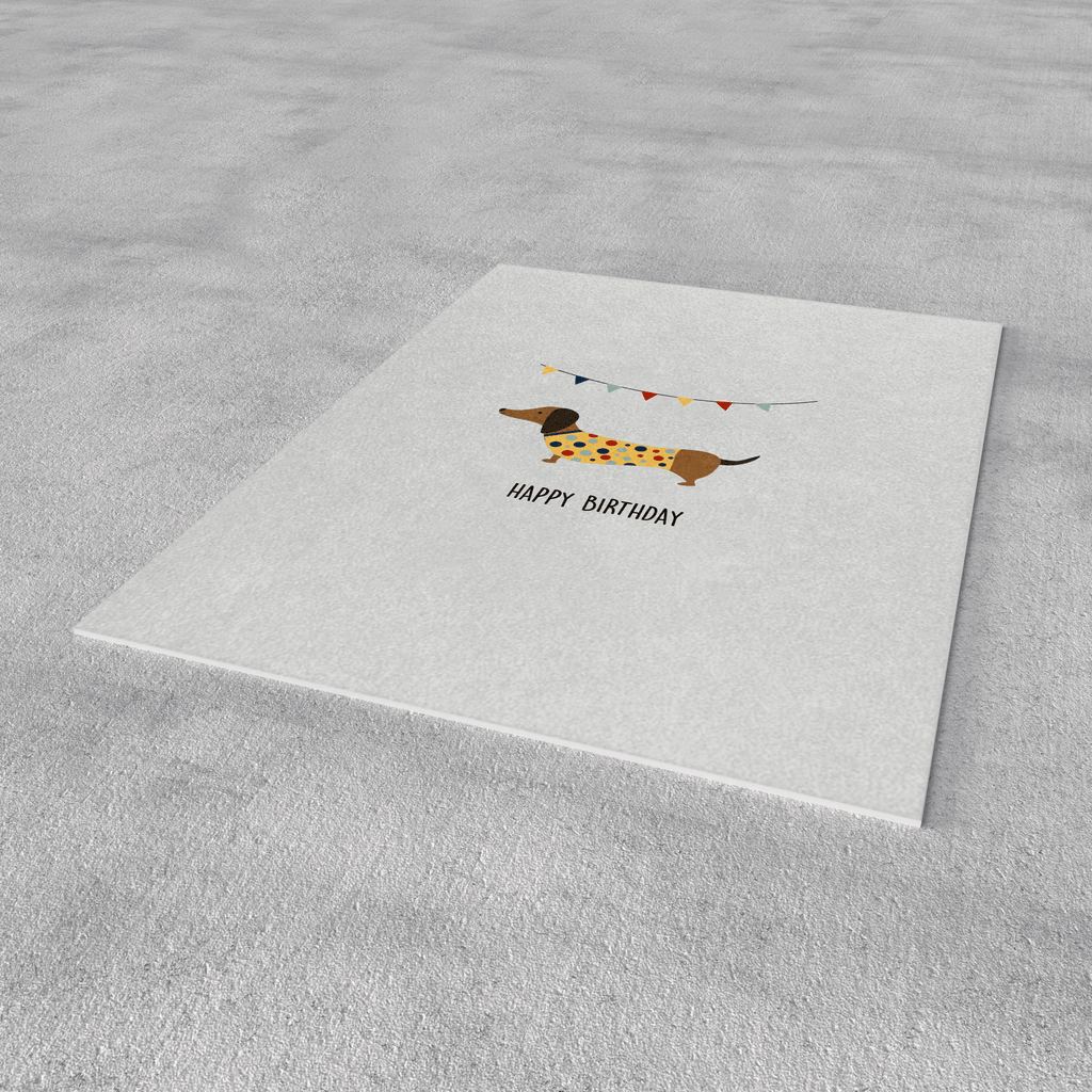 Postkarte „Happy Birthday“ – Partydackel mit Girlande
