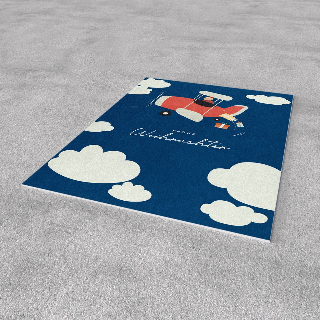 Postkarte"Frohe Weihnachten" - Weihnachtsflugzeug in den Wolken