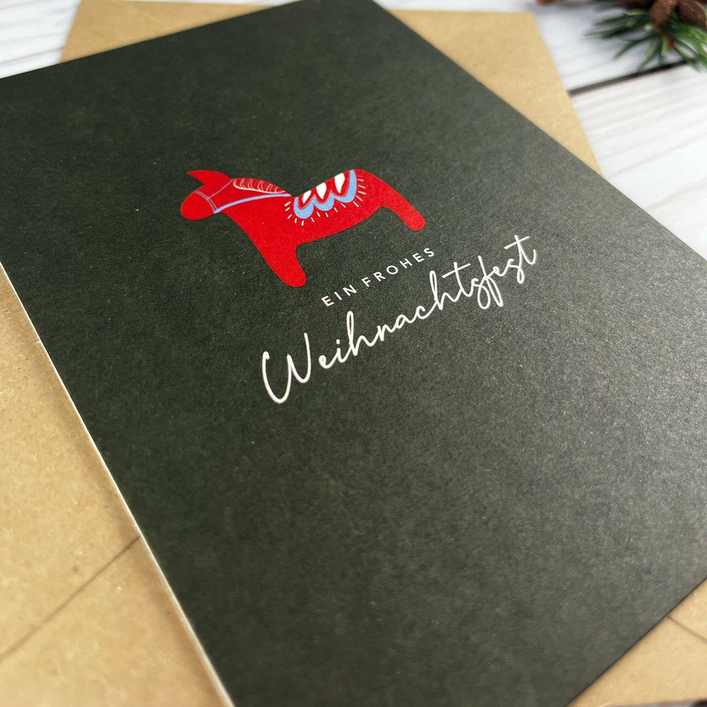 Postkarte „Ein frohes Weihnachtsfest“ – mit Dalapferd