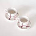 Zwei rot karierte, handbemalte Espressotassen mit Untertassen von Magazin Minori