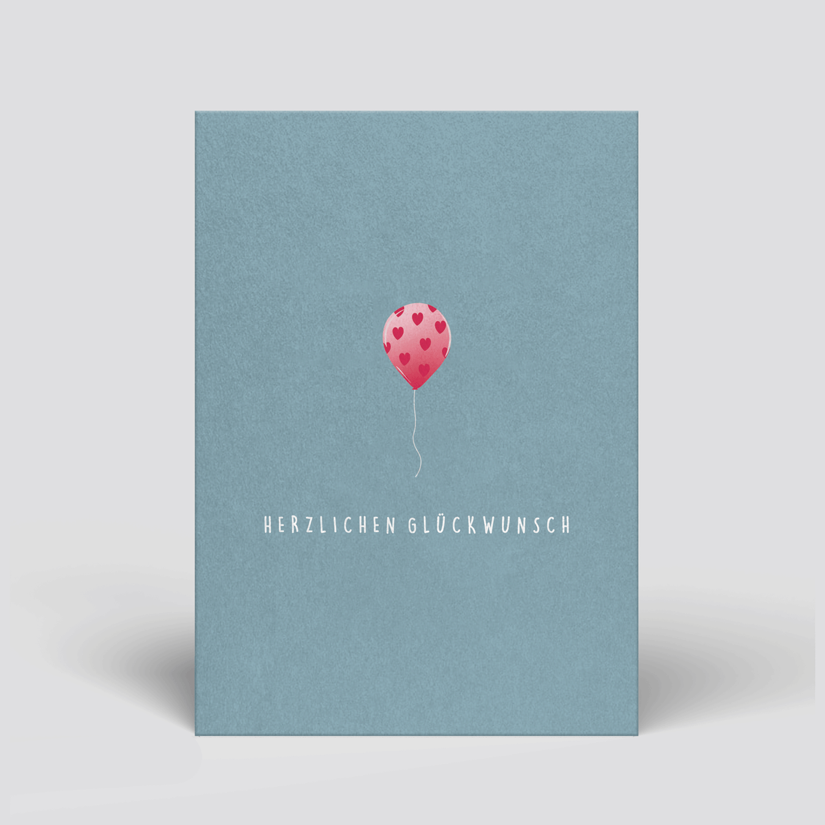 Glückwunschkarte „Herzlichen Glückwunsch“ mit illustriertem rosa Luftballon von Naturbedacht, Vorderseite